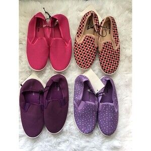 4 Pairs of girls slip on sneakers. Size Small. New with tags.